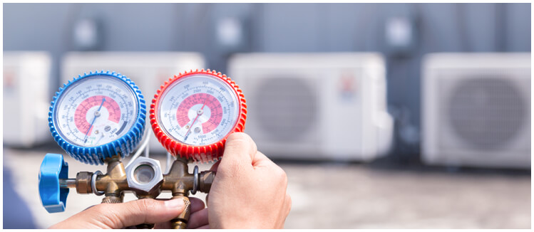 air conditioning technician testing equipment